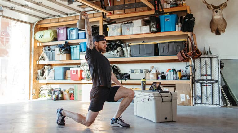 Man training in garage gym