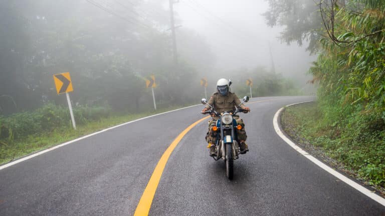 Unidentified rider with motorcycle royal enfield classic 500