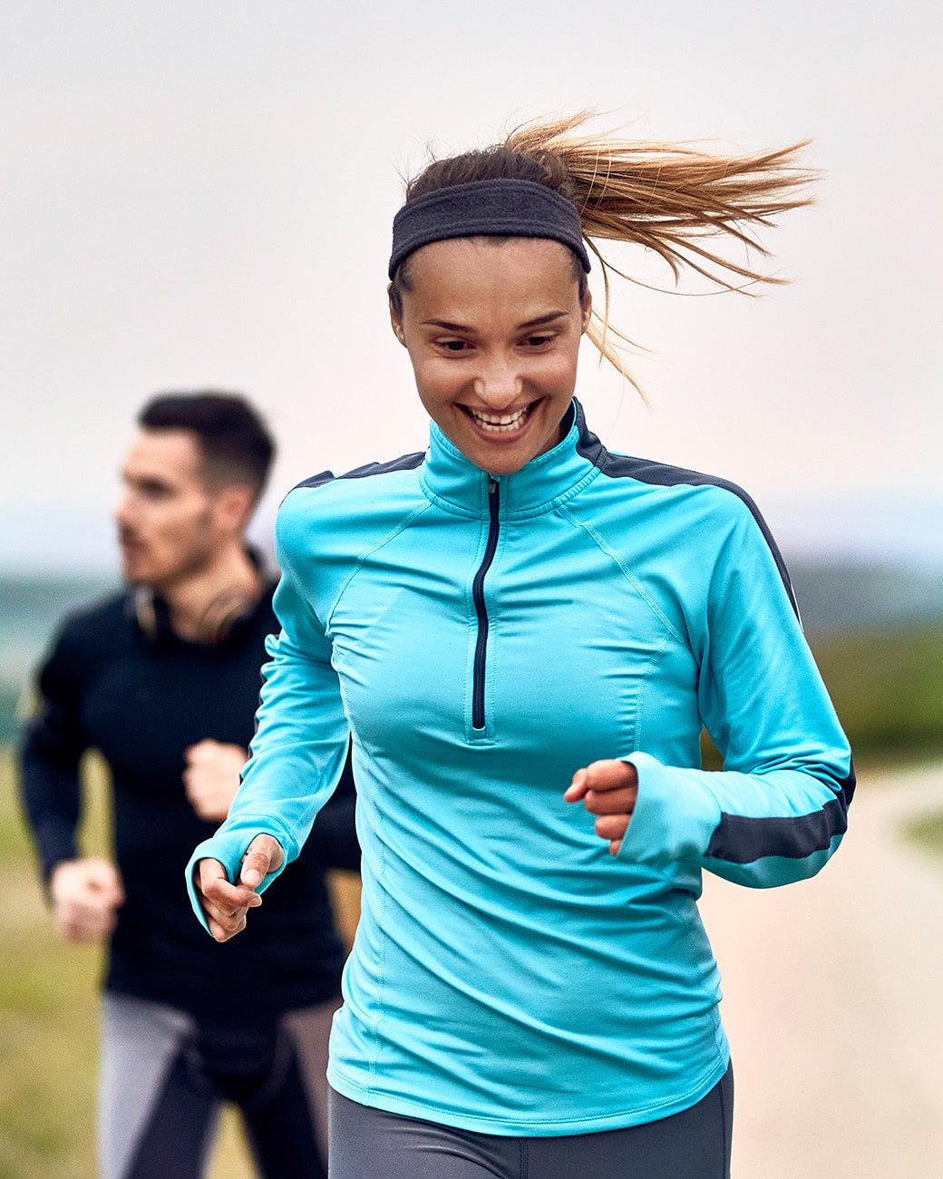 woman running while wearing antibacterial headwear