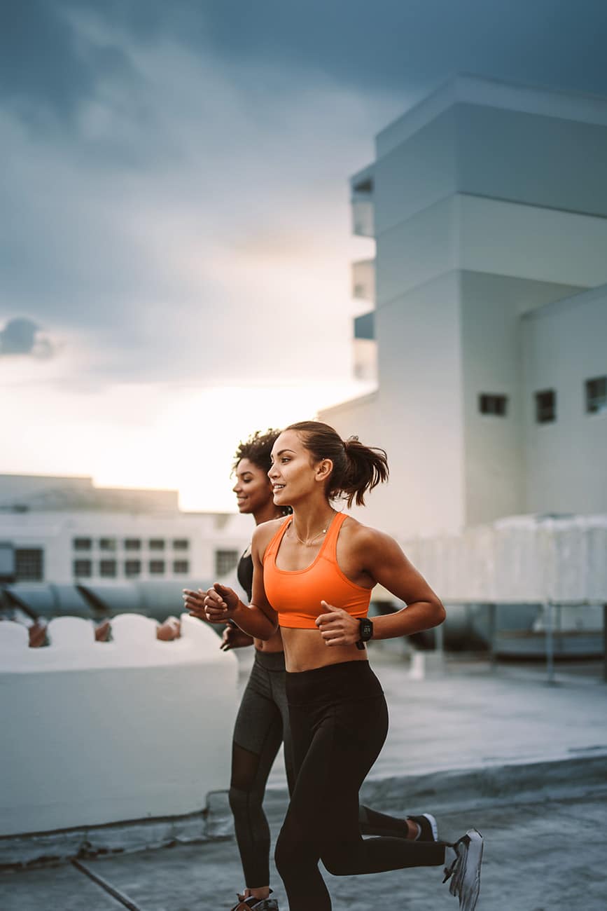 woman running in antimicrobial leggings
